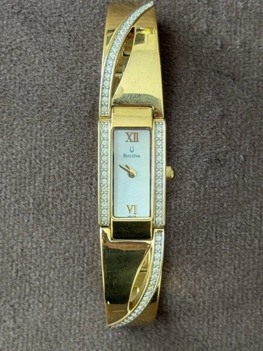 Bulova Women's Quartz Gold Tone Rectangle Bracelet Watch Blue Roman Dial Gem